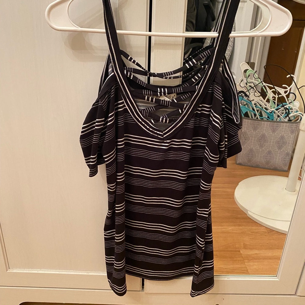Black and white striped cold shoulder top.